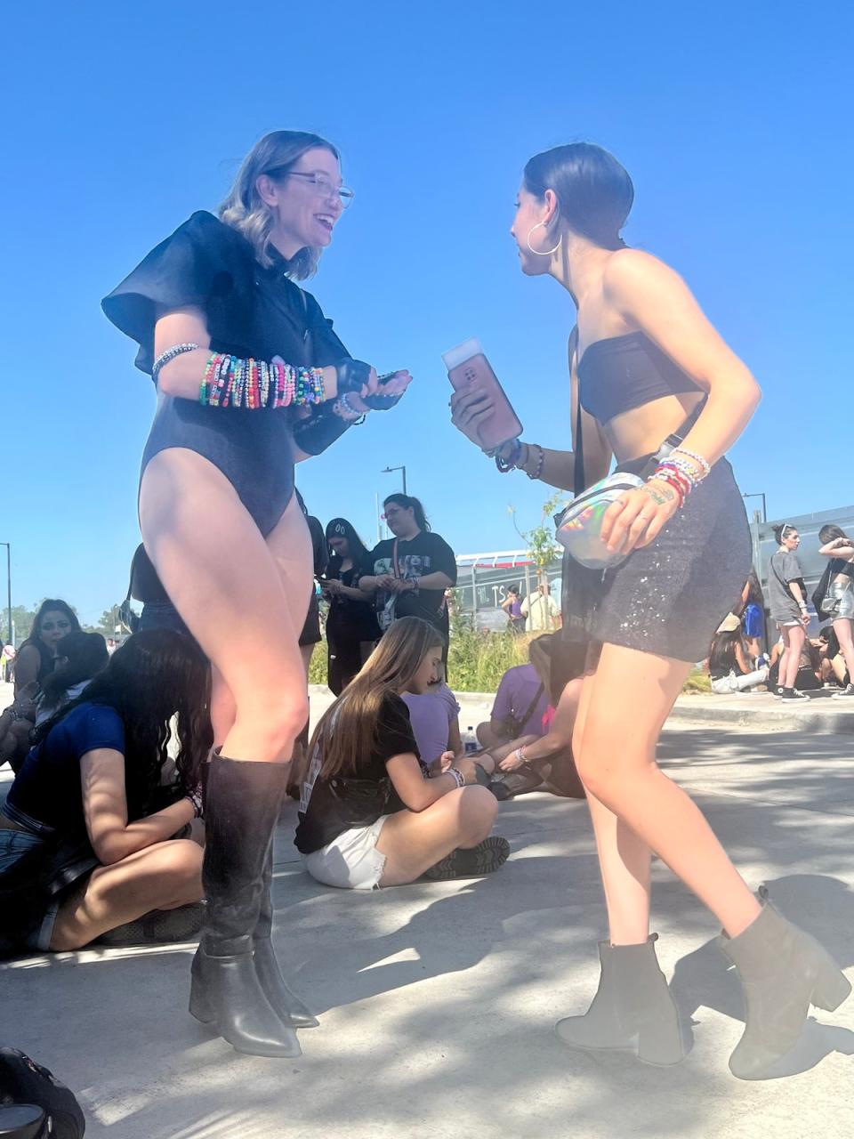 Anna Unruh dancing outside the Swift concert in Buenos Aires on Sunday (Andrea Cavallier / The Independent)