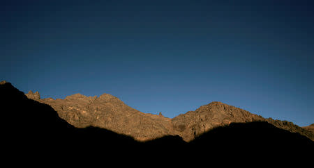 FILE PHOTO: The sun illuminates the Toubkal region near Imlil October 31, 2009. REUTERS/Rafael Marchante/File Photo
