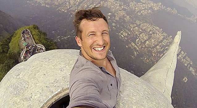 Lee Thomson scaled the Christ The Redeemer statue. Picture: Twitter