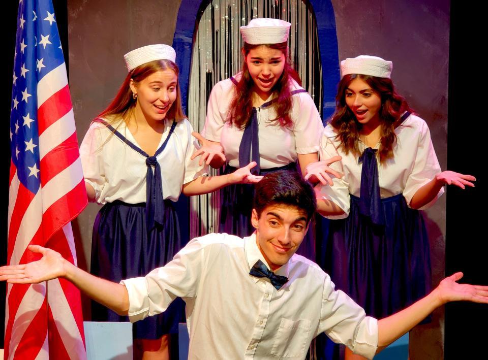 Victoria Hickman, left, Jenna Weisbach, Sophie Stechmann and Reid Graham, kneeling, star in "The Pin-Up Girls," which opens July 5 and continues through July 15, 2023, at Canterbury Summer Theatre in Michigan City.