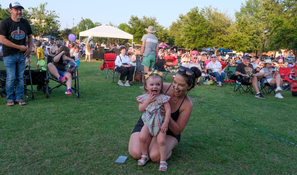 Mahaley Smith and her little girl Leighton Smith dance to the music as music lovers gather at Government Plaza for Live at the Plaza Friday, June 23, 2023.