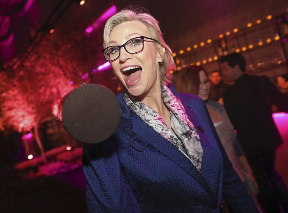 Jane Lynch beams after snagging an award for outstanding performance by an ensemble in a comedy series for <em>The Marvelous Mrs. Maisel</em>.