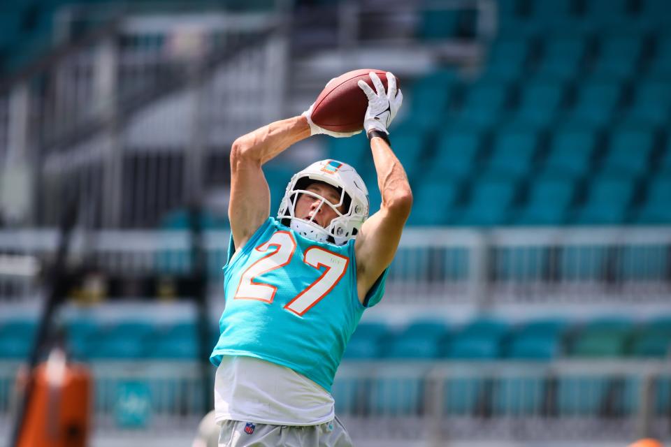 Jun 4, 2024; Miami Gardens, FL, USA; Miami Dolphins cornerback Ethan Bonner (27) catches the football during mandatory minicamp at Baptist Health Training Complex. Mandatory Credit: Sam Navarro-USA TODAY Sports