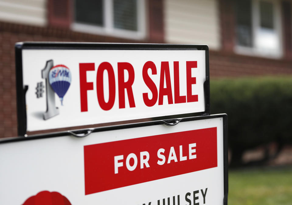 In this Tuesday, Oct 2, 2018, photograph, a for sale sign stands outside a home on the market in the north Denver suburb of Thornton, Colo. (AP Photo/David Zalubowski)