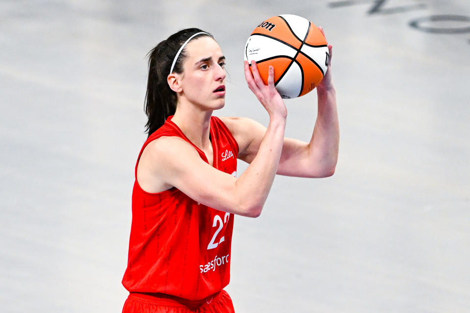 ATLANTA, GA, AUGUST 26: Indiana player Caitlin Clark (22) shoots a free throw during the WNBA game between the Indiana Fever and the Atlanta Dream on August 26, 2024 at the State Farm Arena in Atlanta, GA. (Photo by Rich von Biberstein/Icon Sportswire via Getty Images)