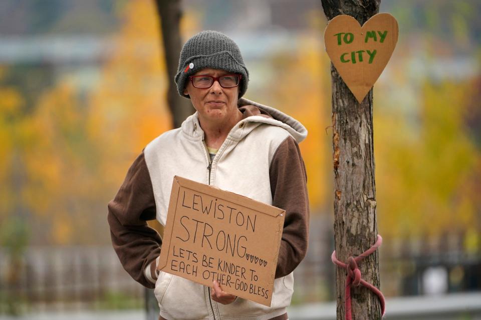 Jess Paquette expresses her support for her city in the wake of Wednesday's mass shootings at a restaurant and bowling alley, Thursday, Oct. 26, 2023, in Lewiston, Maine.