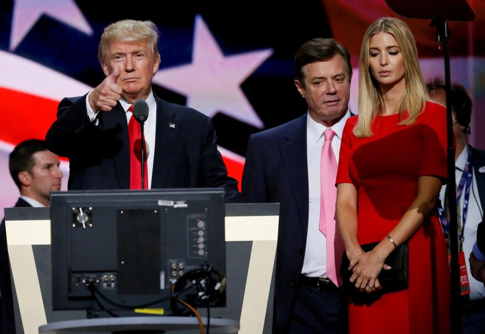 Donald Trump gave a thumbs-up at the Republican National Convention in Cleveland in July 2016 as his former campaign manager, Paul Manafort, and daughter, Ivanka, looked on. (Photo: Rick Wilking/Reuters)