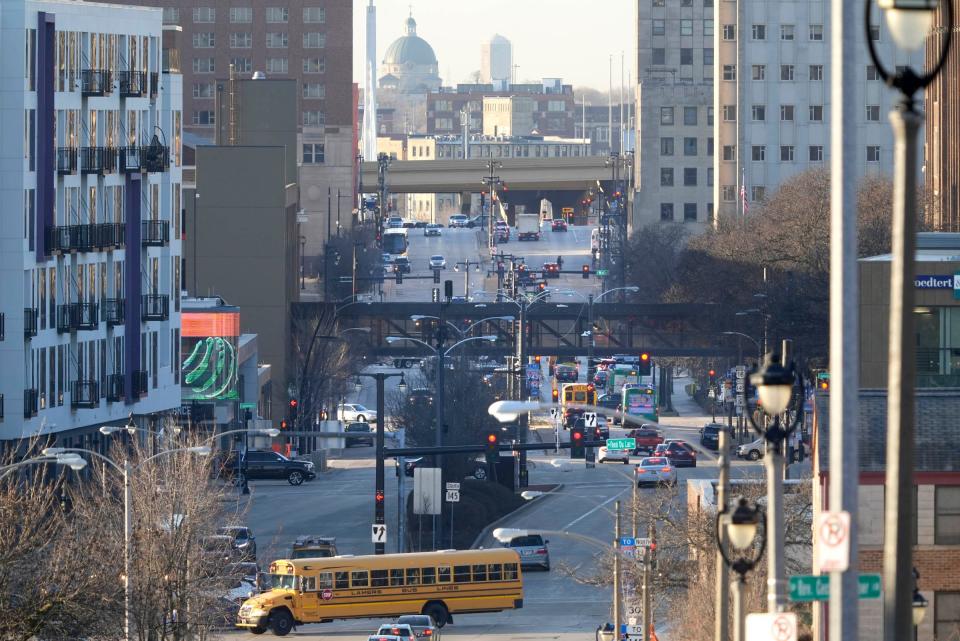 Traffic moves along North Sixth Street looking south to the downtown area in Milwaukee on Wednesday, March 13, 2024. President Joe Biden is expected to highlight a $36.6 million allocation for a project to convert a 2.6-mile section of Sixth Street to a "complete street" during his visit to Milwaukee on Wednesday.