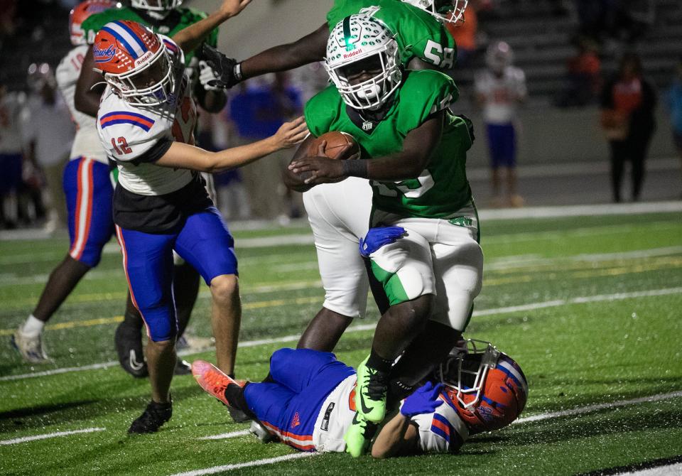 Trevon Moate of Fort Myers runs in a touchdown against Cape Coral on Thursday night, Nov. 2, 2023, at Fort Myers High School.