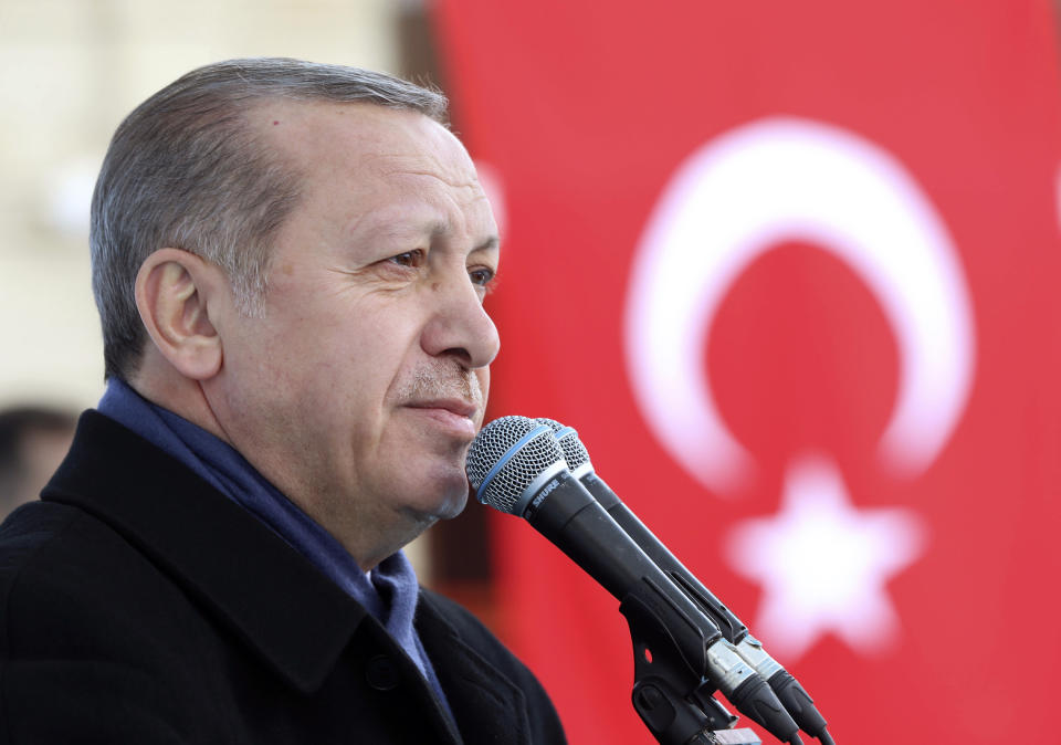 Turkey's President Recep Tayyip Erdogan addresses his supporters in Eskisehir, Turkey Friday, March 17, 2017. Erdogan has called on Turks living in Europe to have at least five children, saying it would be the best response to European's "injustices." Erdogan made the comments Friday while campaigning in the city of Eskisehir for a referendum that would usher in a presidential system and enhance his powers. (Murat Cetinmuhurdar/Presidential Press Service, Pool Photo via AP)