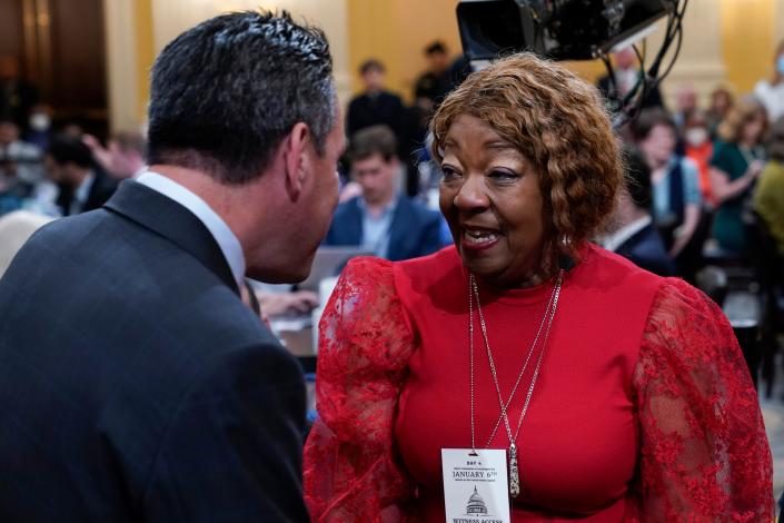 Ruby Freeman, mother of Shaye Moss, a former Georgia election worker, talks with Rep. Pete Aguilar, D-Calif., on June 21 as the House select committee investigates the Jan. 6 attack on the U.S. Capitol.
