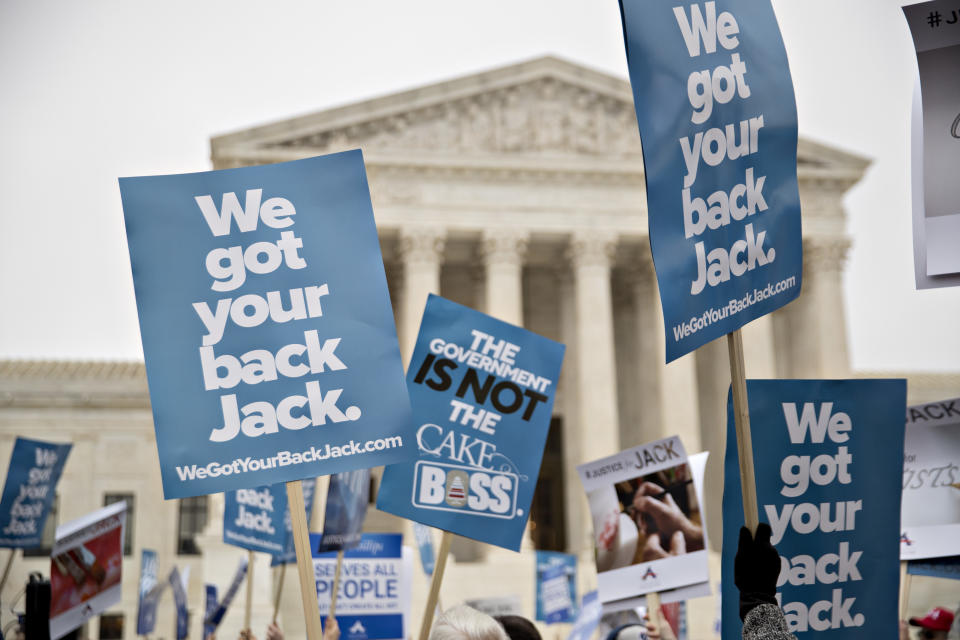 Demonstrators hold signs in support of Masterpiece Cakeshop owner Jack Phillips outside the U.S. Supreme Court on Tuesday, Dec. 5, 2017.&nbsp; (Photo: Bloomberg via Getty Images)