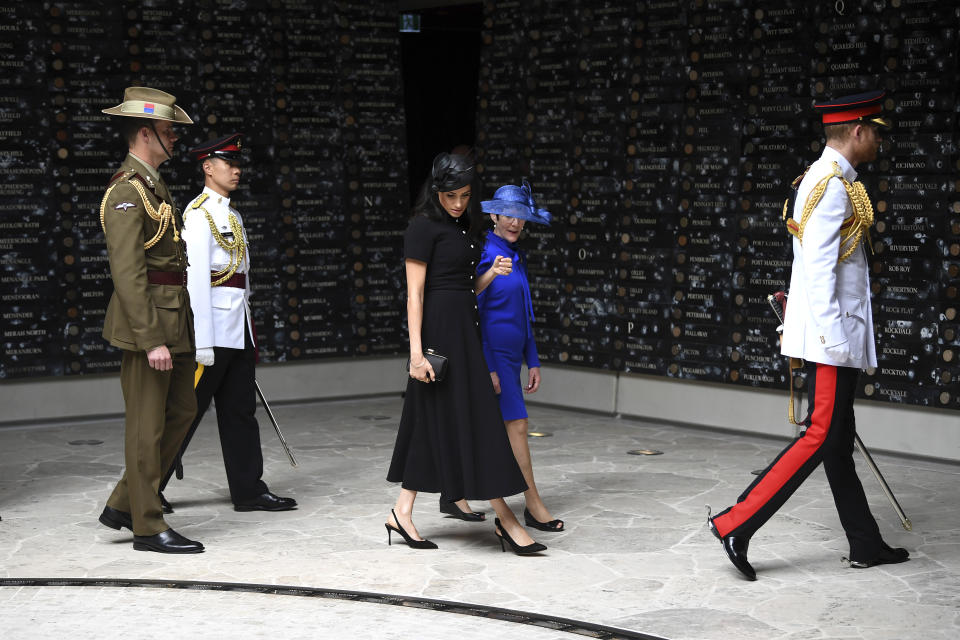 Britain's Prince Harry, right, and his wife Meghan, center left, the Duchess of Sussex view the Hall of Service during the official opening of Anzac Memorial at Hyde Park in Sydney, Australia, Saturday, Oct. 20, 2018. Prince Harry and his wife Meghan, Duchess of Sussex, are on a 16-day tour to Australia and the South Pacific. (Joel Carrett/Pool Photo via AP)