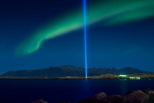 Aurora Borealis with  the Imagine Peace Tower, Videy Island Reykjavik Iceland