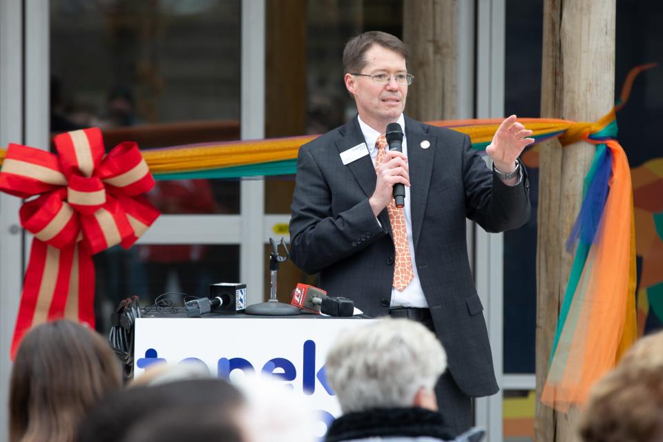 Fred Patton, Kansas representative and president of the Friends of the Topeka Zoo, gives remarks before the ribbon cutting of the Giraffe & Friends exhibit in March 2023. Patton said he is resigning his House seat to spend more time with his family, law firm and community involvements.