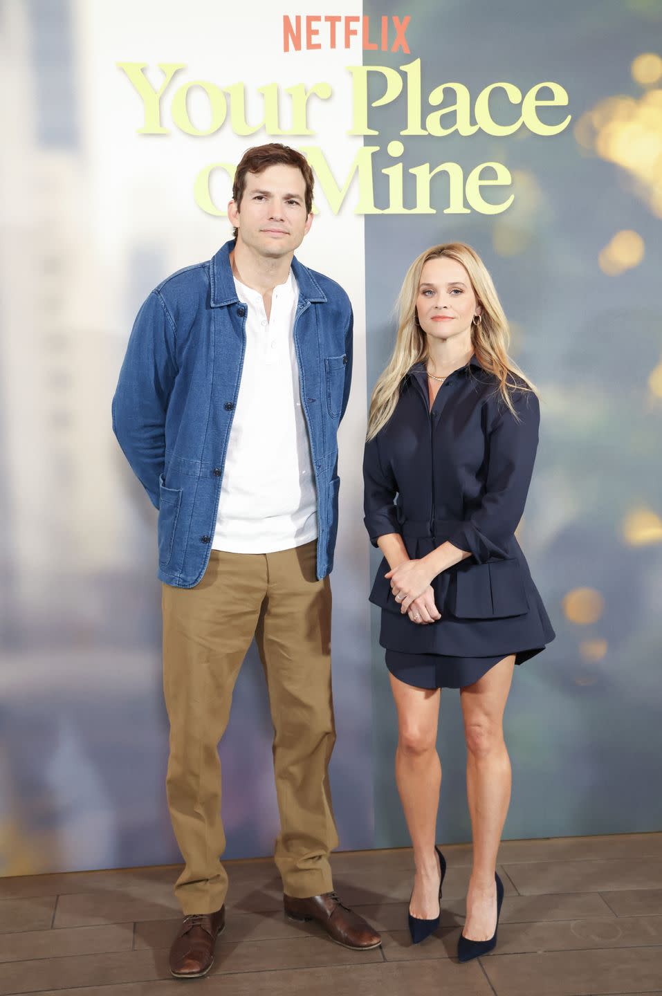 ashton kutcher and reese witherspoon at the photocall for netflix's 