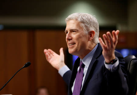 FILE PHOTO - U.S. Supreme Court nominee judge Neil Gorsuch testifies during the second day of his Senate Judiciary Committee confirmation hearing on Capitol Hill in Washington, DC, U.S. on March 21, 2017. REUTERS/Joshua Roberts/File Photo