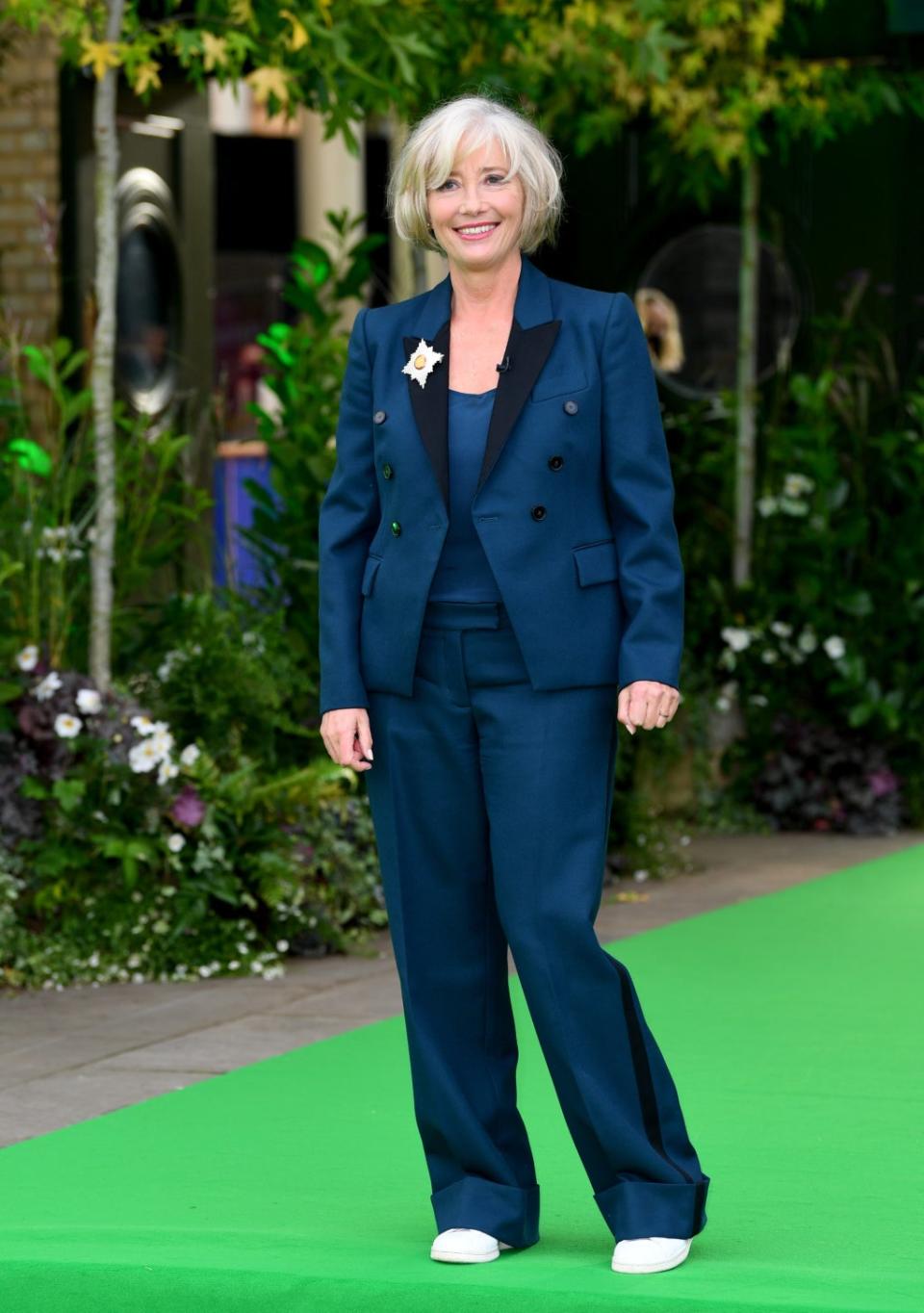 Dame Emma Thompson looked stylish in a blue suit and white trainers (Joe Maher/Getty)