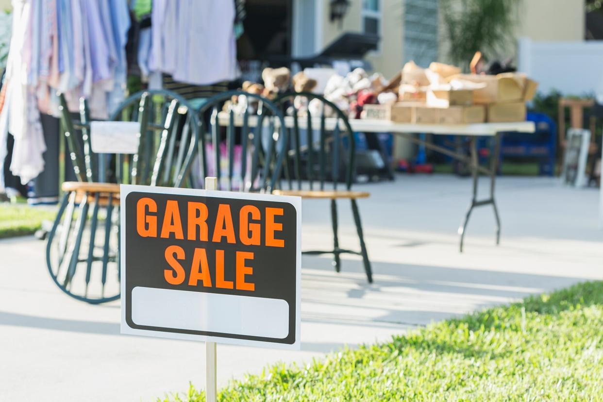 garage sale sign in yard