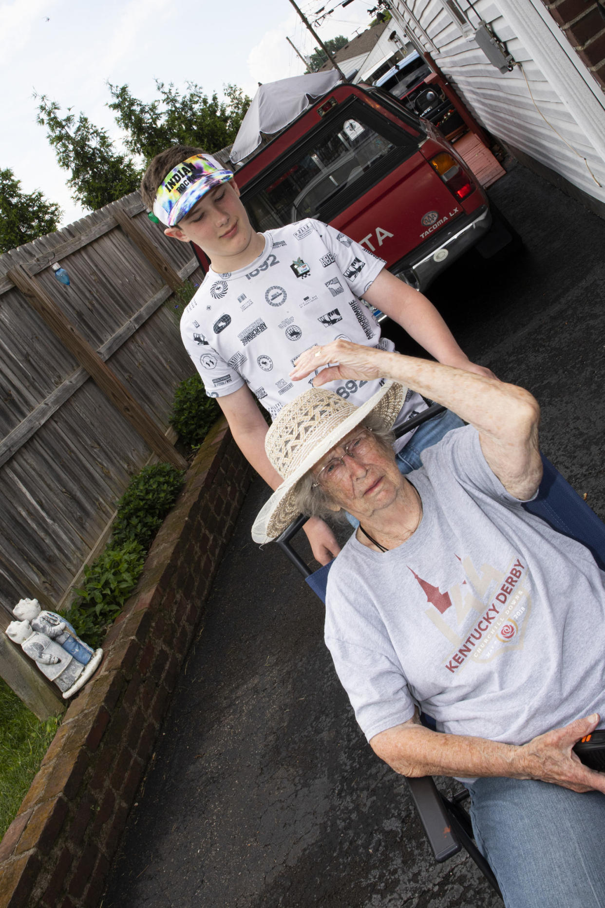 Aileen Nova Jackson, 88, and her 12-year-old grandson, Joey Jackson, can host about 15 vehicles at a time on Derby weekend. (Lili Kobielski for NBC News)