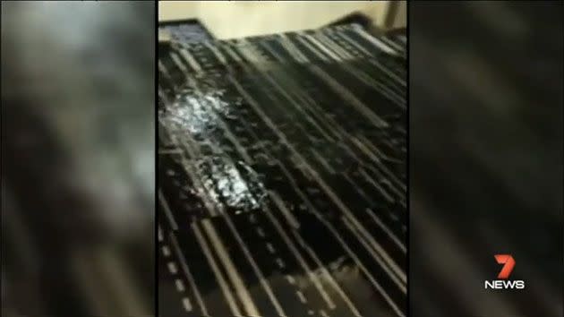 The carpet became submerged under the flowing storm water sweeping the cruise ship corridors. Photo: 7 News