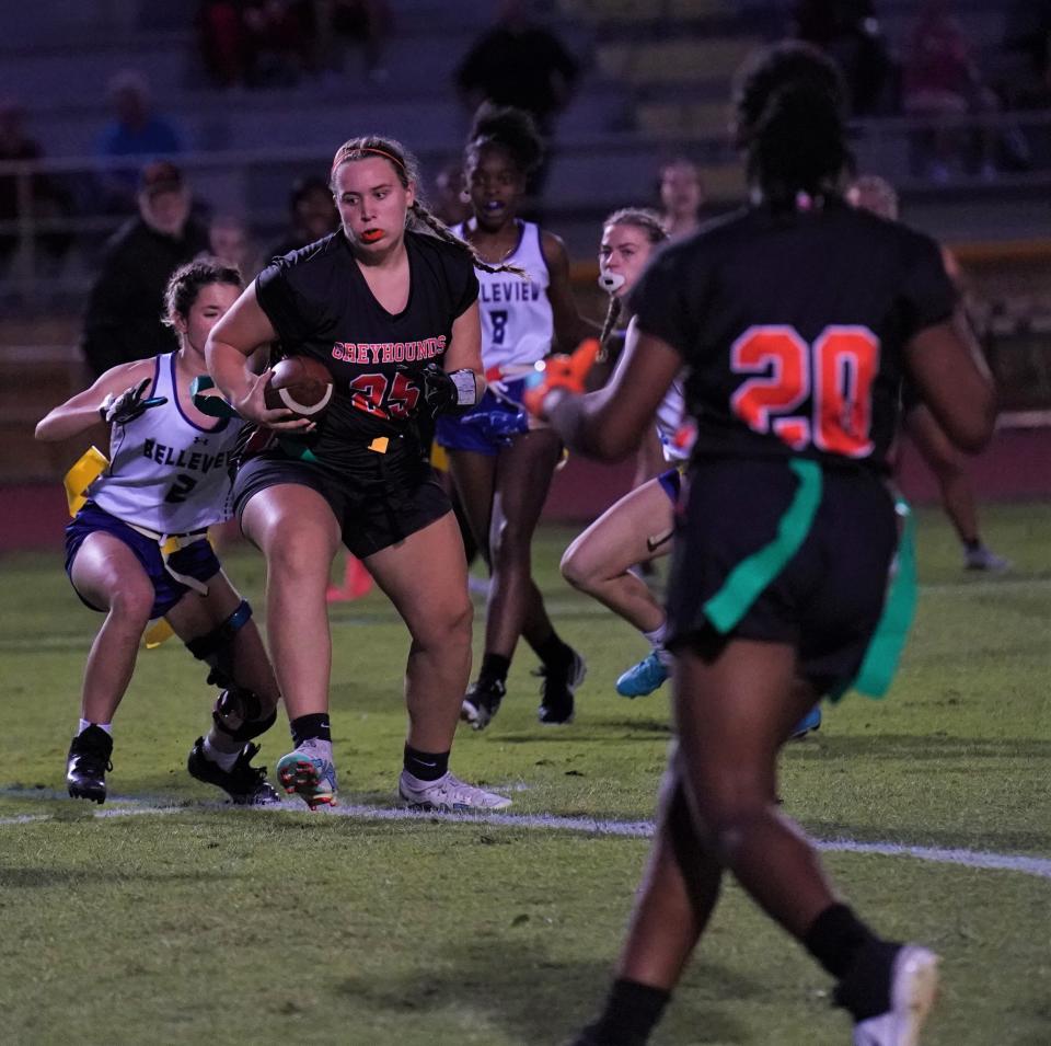 Lincoln Park Academy's Kylah Tiger gains yardage during a Region 3-1A quarterfinal against Belleview on Wednesday, April 26, 2023 at Lawnwood Stadium in Fort Pierce. The Greyhounds won 26-7.