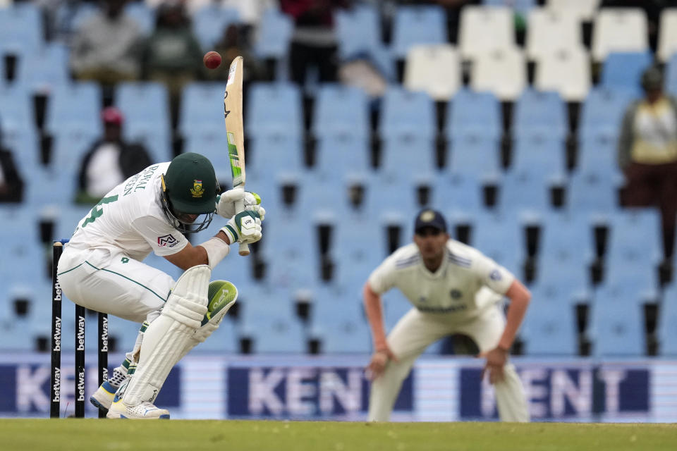 South Africa's batsman Dean Elgar ducks under a high ball from India's bowler Prasidh Krishna during the second day of the Test cricket match between South Africa and India, at Centurion Park, in Centurion, on the outskirts of Pretoria, South Africa, Wednesday, Dec. 27, 2023. (AP Photo/Themba Hadebe)