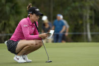 Gaby Lopez, of Mexico, prepares to putt on the first green during the third round of the LPGA Tour Championship golf tournament, Saturday, Nov. 20, 2021, in Naples, Fla. (AP Photo/Rebecca Blackwell)