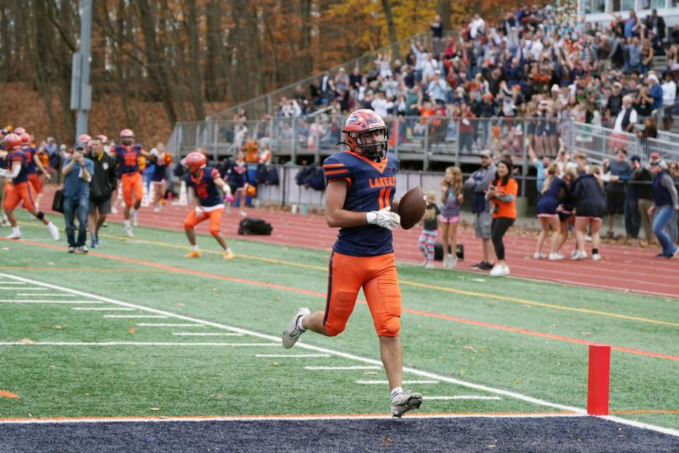 Mountain Lakes hosts Brearley in a high school football sectional final on Saturday, November 12, 2022. ML #11 Gavin Ananian scores a touchdown in the second quarter.