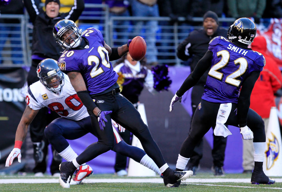BALTIMORE, MD - JANUARY 15: Ed Reed #20 of the Baltimore Ravens intercepts the ball against Andre Johnson #80 of the Houston Texans during the fourth quarter of the AFC Divisional playoff game at M&T Bank Stadium on January 15, 2012 in Baltimore, Maryland. (Photo by Chris Trotman/Getty Images)