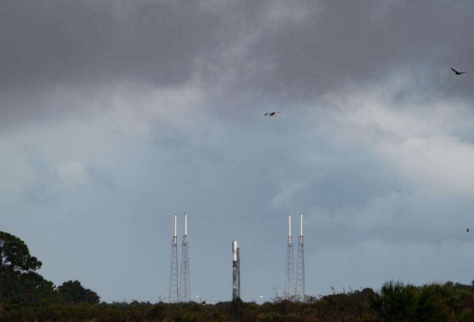 A SpaceX Falcon 9 rocket stands ready for liftoff at Cape Canaveral Space Force Station's Launch Complex 40 with the COSMO-SkyMed-2 satellite on Thursday, Jan. 27, 2022.