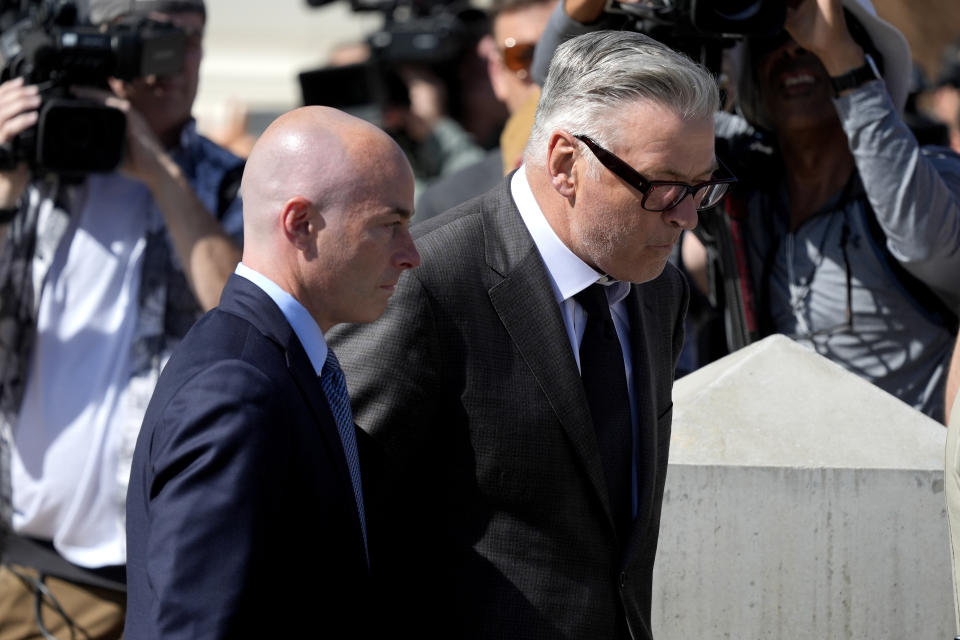 Actor Alec Baldwin, right, and attorney Luke Nikas, leave court after jury selection in Baldwin's involuntary manslaughter trial, Tuesday, July 9, 2024, in Santa Fe, N.M. (AP Photo/Ross D. Franklin)