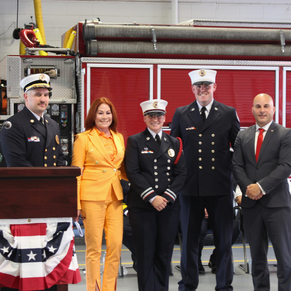 New promoted Perth Amboy Fire Capt. Arielle Bonilla, in the middle, following a swearing in ceremony Thursday at the Perth Amboy Fire Department headquarters on New Brunswick Avenue.