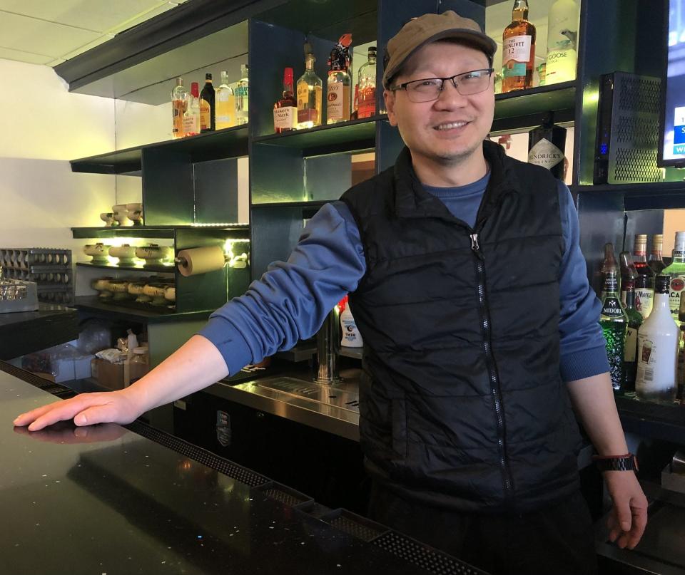 Tony Lin stands at the bar of his new restaurant, Kai Asian Fusion, in Wells, Maine, on Monday, Feb. 5, 2024.
