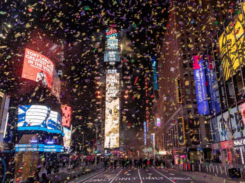 Confetti flies around the ball and countdown clock in Times Square during the virtual New Year's Eve event New York, U.S., January 1, 2021.