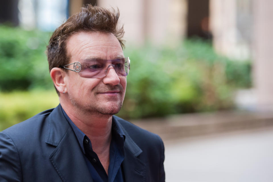 FILE - In this Tuesday, Oct. 9, 2012 file photo, U2 front man Bono, and a founder of the charity, ONE International, arrives for a meeting with European Council President Herman Van Rompuy, not seen, at the EU Council in Brussels. Bono is one of the world's leading celebrity contributor's to charity. (AP Photo/Geert Vanden Wijngaert, File)