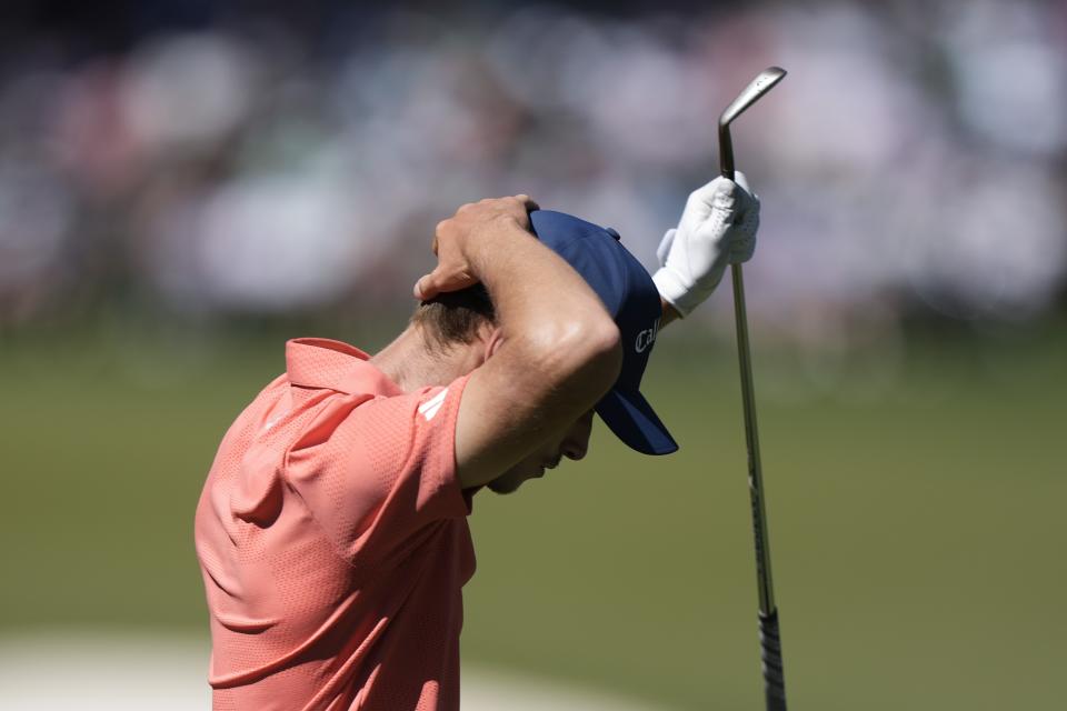 Nicolai Hojgaard, of Denmark, reacts to his tee shot on the sixth hole during third round at the Masters golf tournament at Augusta National Golf Club Saturday, April 13, 2024, in Augusta, Ga. (AP Photo/Charlie Riedel)