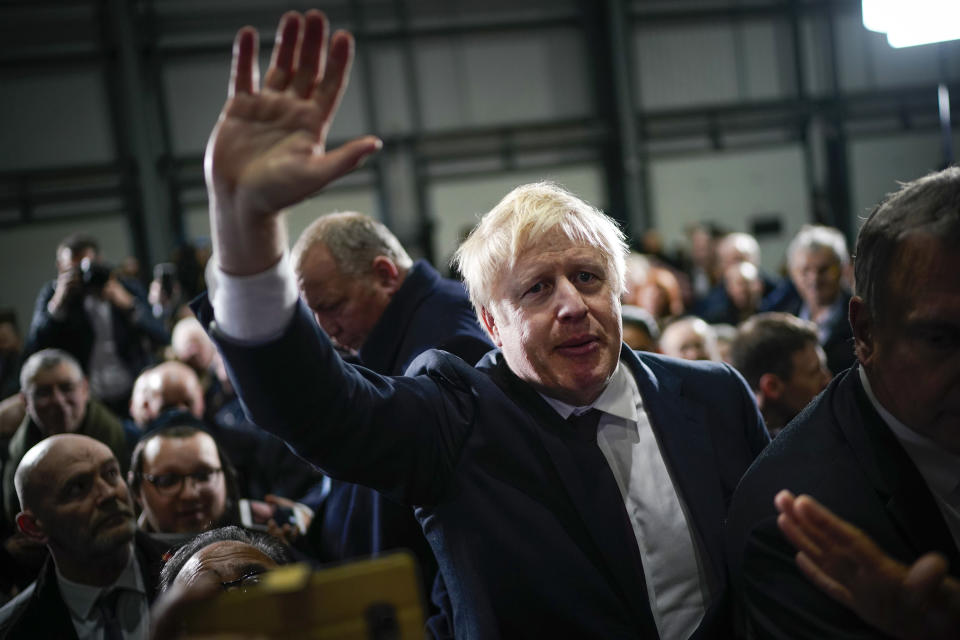 British Prime Minister Boris Johnson is applauded by supporters after speaking at the Globus Group factory on December 10, 2019 in Manchester, England. The U.K. will go to the polls in a general election on December 12. Photo: Christopher Furlong/Getty Images