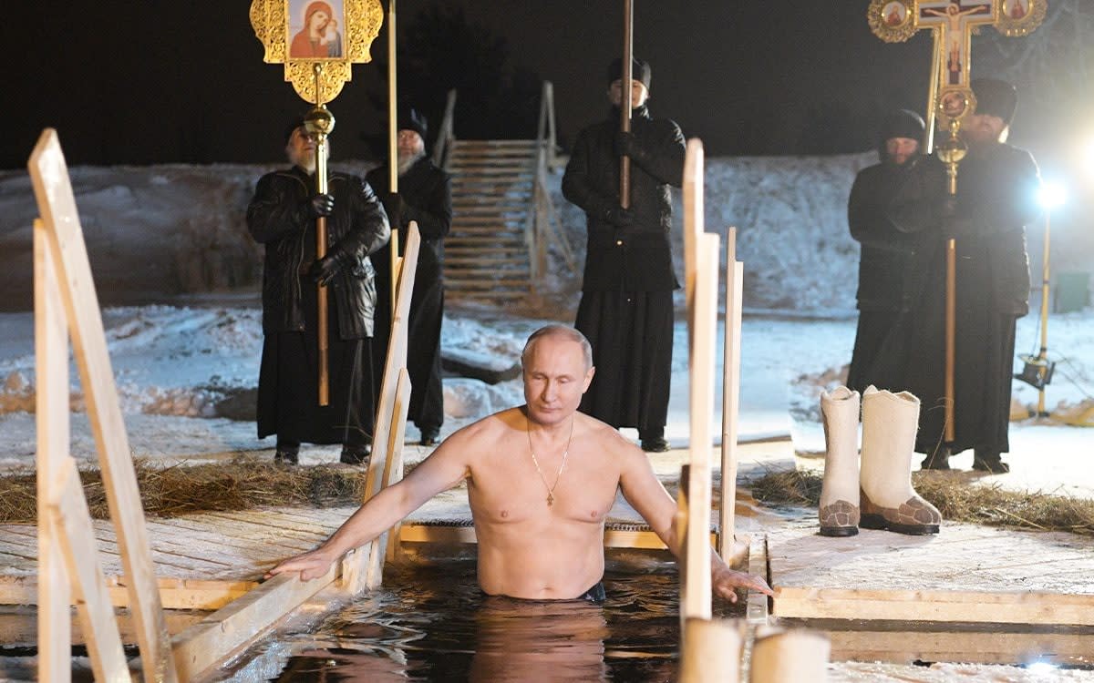 Putin takes a dip in the water during Orthodox Epiphany celebrations at lake Seliger, Tver region, Russia January 19, 2018