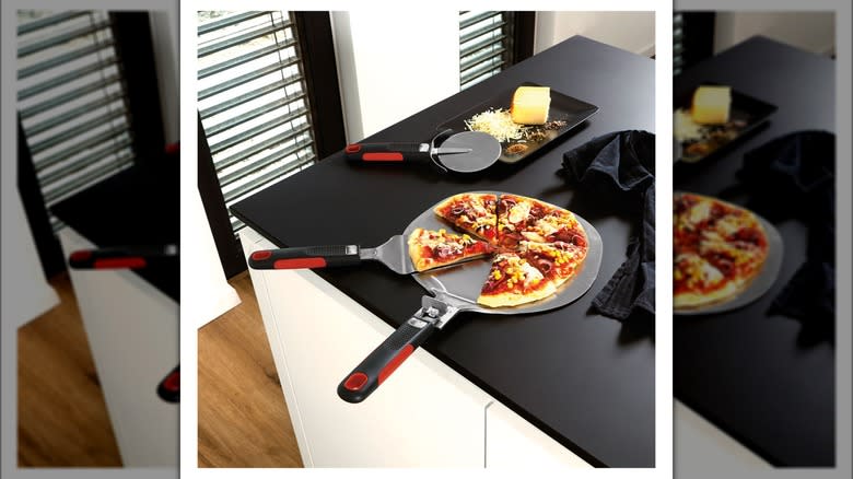 Pizza with kitchenware