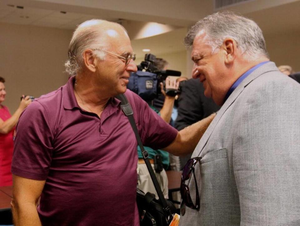 Singer Jimmy Buffett, left, greets Reed Guice after the Mississippi Gaming Commission meeting in 2011. Buffett and Guice were fraternity brothers at USM.