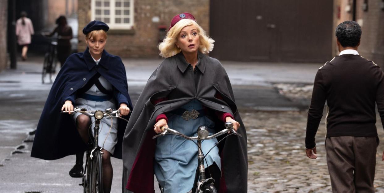 helen george as trixie franklin riding a bike, call the midwife season 13