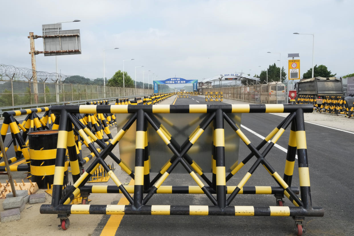 Barricades are placed near the Unification Bridge, which leads to the Panmunjom in the Demilitarized Zone in Paju, South Korea, Wednesday, July 19, 2023. An American soldier who had served nearly two months in a South Korean prison, fled across the heavily armed border into North Korea, U.S. officials said Tuesday, becoming the first American detained in the North in nearly five years. (AP Photo/Ahn Young-joon)