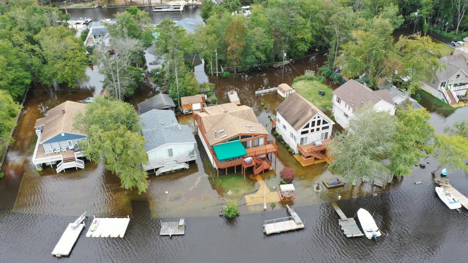 King tide flooding in October 2019 along the Mullica River in Southeastern New Jersey. As sea levels rise, NOAA forecasts say coastal flooding will occur more often. [Photos by Life on the Edge Drones, provided by Jacques Cousteau National Estuarine Research Reserve]