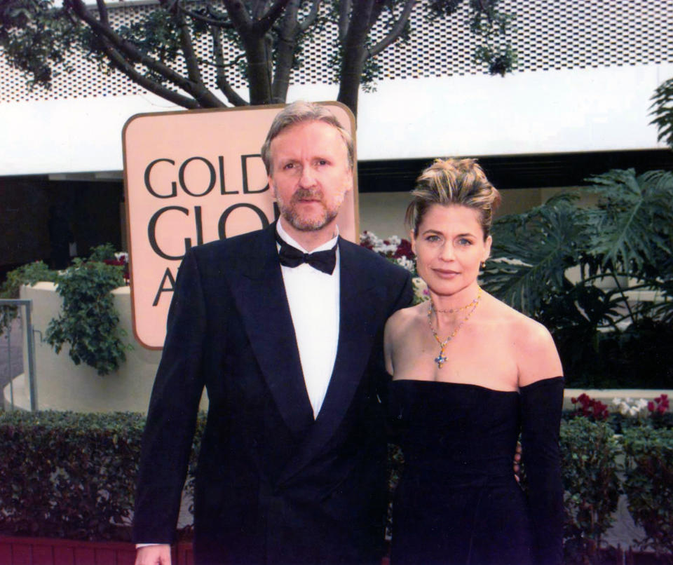 Portrait of married couple, director James Cameron and actress Linda Hamilton, as they pose together at the Beverly Hilton Hotel during the 55th Golden Globe Awards, Los Angeles, California, January 18, 1998. Cameron won the Best Director award for 'Titanic.' (Photo by Bob Riha, Jr./Getty Images)