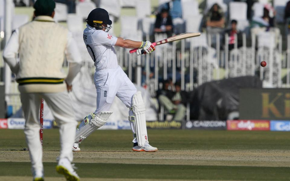 England's Ollie Pope plays a shot during the first day of the first cricket Test match between Pakistan and England at the Rawalpindi Cricket Stadium, in Rawalpindi on December 1, 2022. - Aamir Qureshi/Getty Images