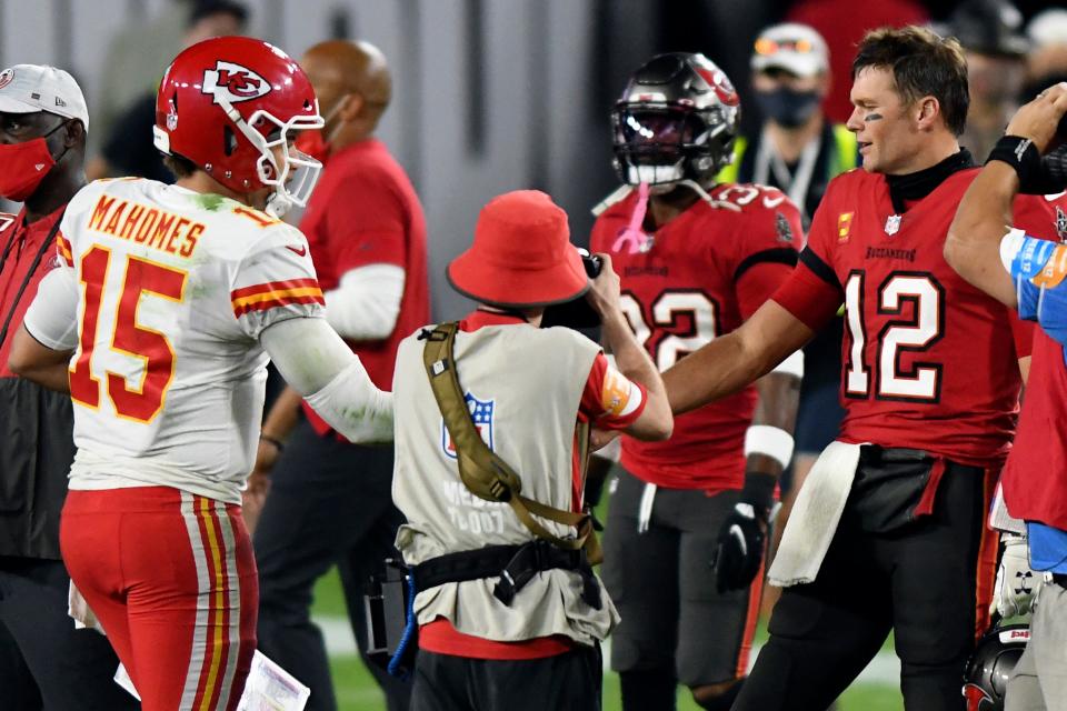 Tampa Bay quarterback Tom Brady (12) congratulates Kansas City Chiefs quarterback Patrick Mahomes (15) after their game in Tampa, Fla., on Nov. 29, 2020.