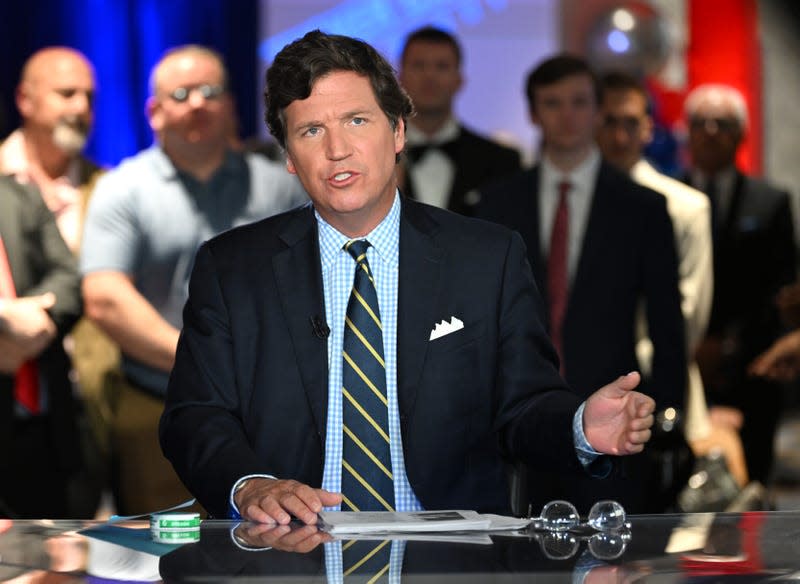 HOLLYWOOD, FLORIDA - NOVEMBER 17: Tucker Carlson speaks during 2022 FOX Nation Patriot Awards at Hard Rock Live at Seminole Hard Rock Hotel & Casino Hollywood on November 17, 2022 in Hollywood, Florida. 