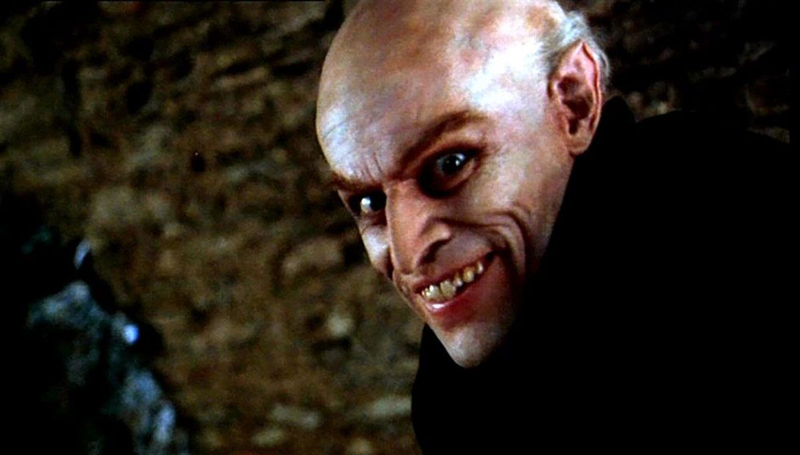 Willem Dafoe gleefully leers at the camera as the monstrous vampire Count Orlok.