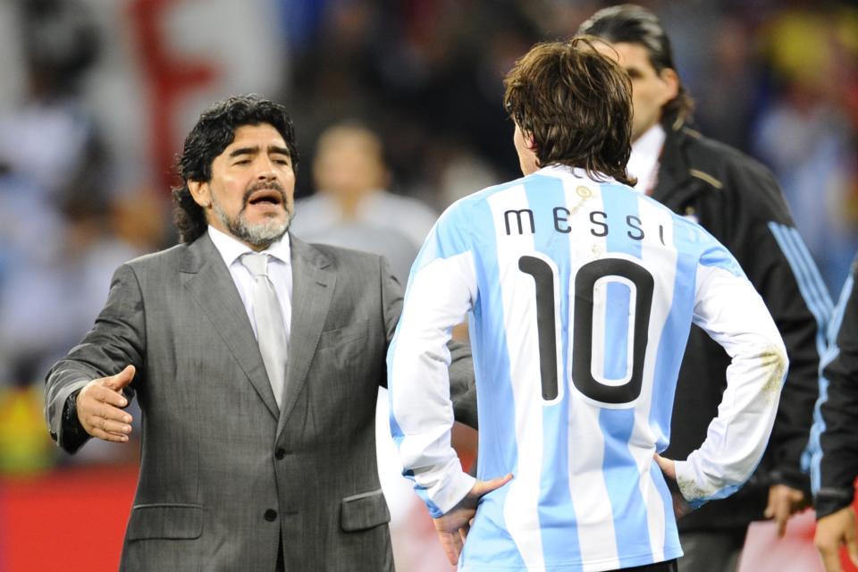 <p>Maradona with Messi after Argentina crashed out of the 2010 World Cup in South Africa</p>AFP/Getty